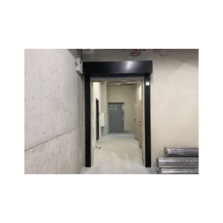 Vertical sliding fire door