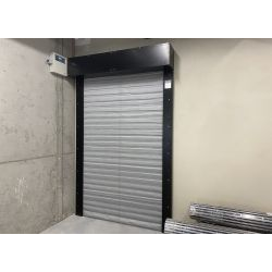 Vertical sliding fire door